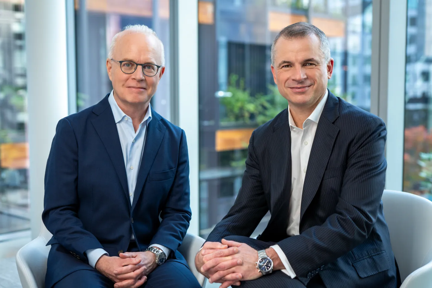 Bill Malley, Firm Managing Partner, Perkins Coie, and Paul Jenkins, Global CEO, Ashurst, sit together to announce Ashurst Perkins Coie.